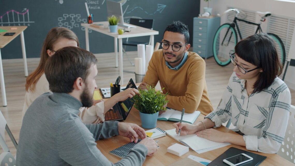 Team collaborating around a table