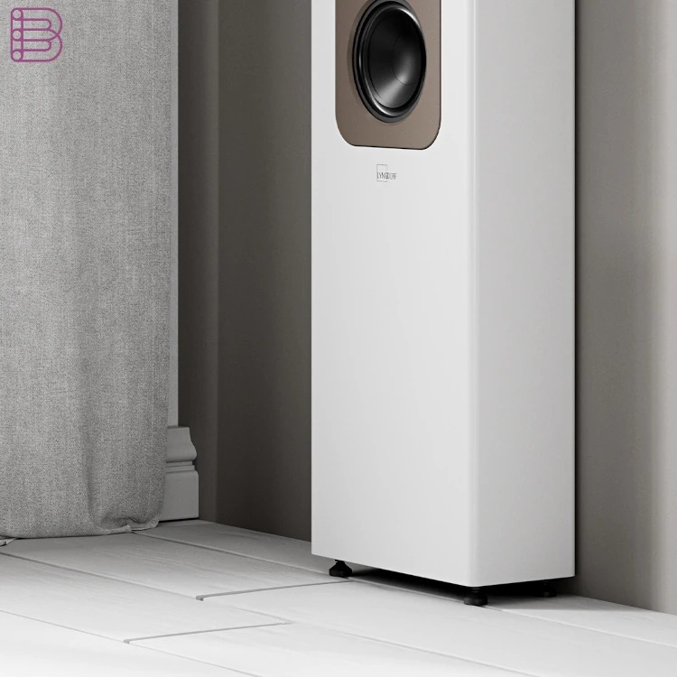 Floorstanding loudspeaker positioned close to a side wall, showing the driver and cabinet at listening height