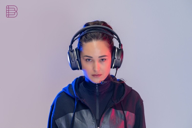 Woman wearing the Audeze Maxwell 2 ANC gaming headset