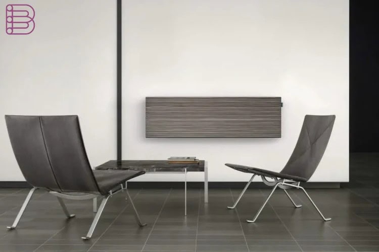 CANVAS L soundbar wall-mounted in a minimalist living room, wood lamella finish