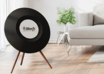 Block Opus L Opus S smart display speaker in a living room with its 19-inch round display showing the Block logo