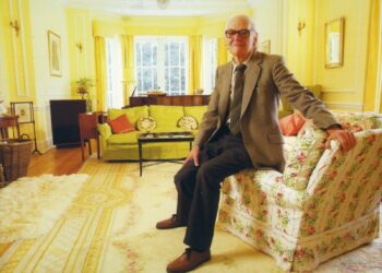 Peter Walker Quad founder relaxing at home with the ESL-63 loudspeakers