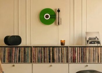 Ruka TD-1 vertical turntable mounted on a wall in a modern living room