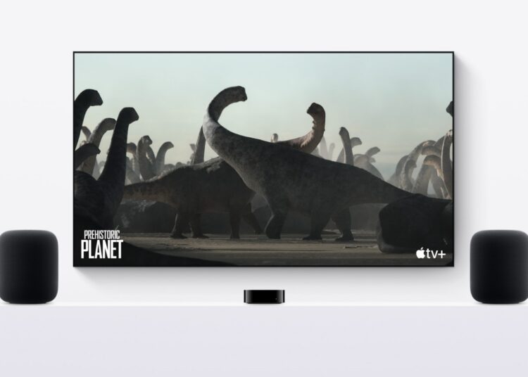 Apple HomePod (2nd generation) speakers flanking a TV showing Apple TV+