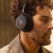 Person wearing Beats 360 over-ear headphones outdoors