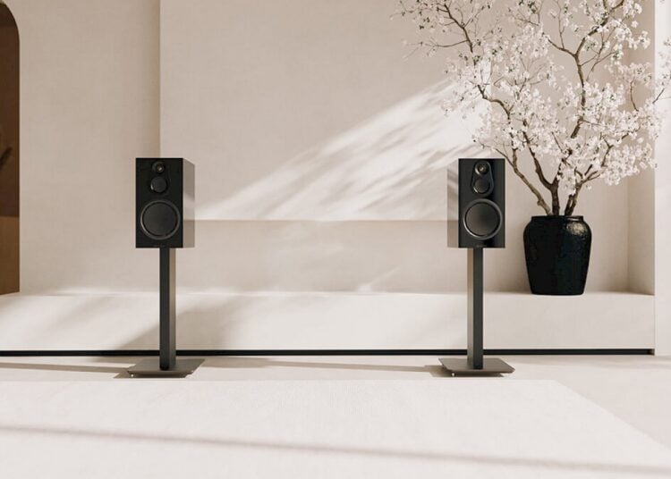 Blok Axis speaker stands supporting standmount loudspeakers in a living room