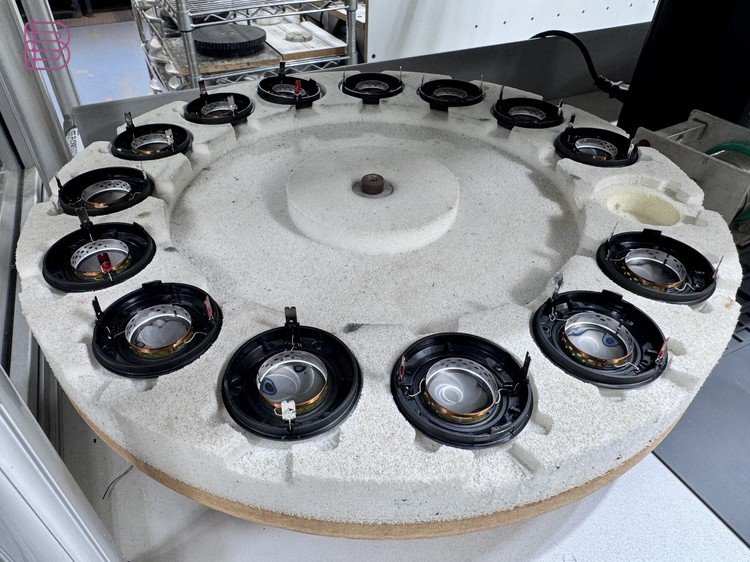 Bowers & Wilkins voice coil assemblies arranged on a test fixture