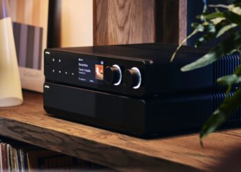 Cyrus 80 AMP full-width streaming integrated amplifier on a living room shelf