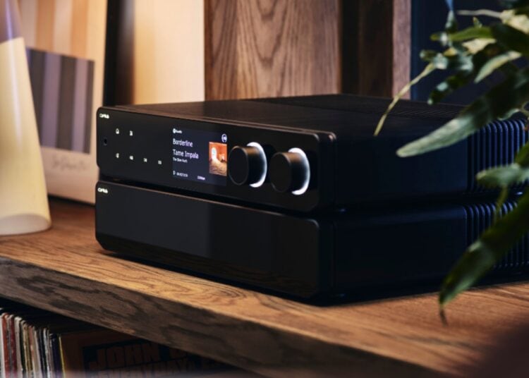 Cyrus 80 AMP full-width streaming integrated amplifier on a living room shelf