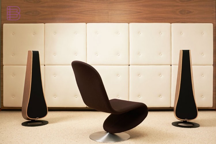 Davone Solo-R loudspeakers flanking a Panton chair in a mid-century modern lounge