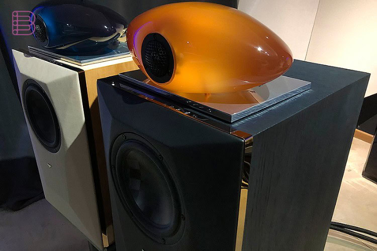Two Falcon Bravo The Dome loudspeakers finished in different dome colors side by side