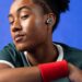 Athlete wearing the Fresh n Rebel Twins Move 2 true wireless sport earbuds