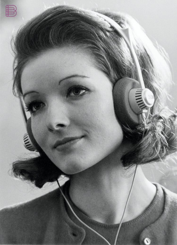 The Sennheiser HD 414 in use, the world's first open-back headphones, launched in 1968