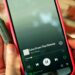 iFi audio GO cable plugged into a smartphone for on-the-go hi-res IEM listening
