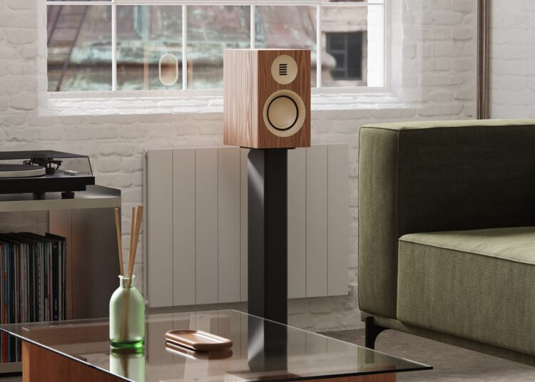 Kanto Tuk G2 powered speaker in a walnut finish in a living room with turntable