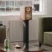 Kanto Tuk G2 powered speaker in a walnut finish in a living room with turntable