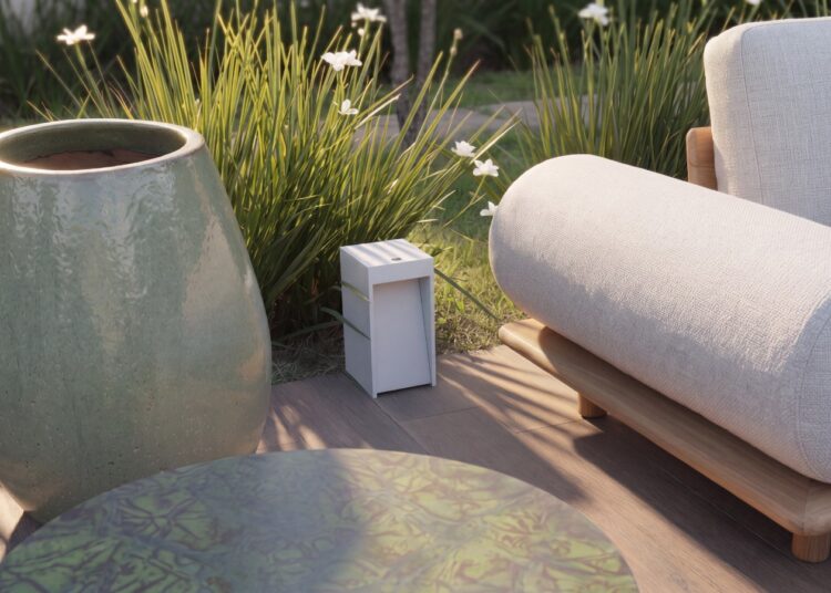 Magna Audio Brutalist Pathway concrete speaker on an outdoor patio