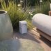 Magna Audio Brutalist Pathway concrete speaker on an outdoor patio