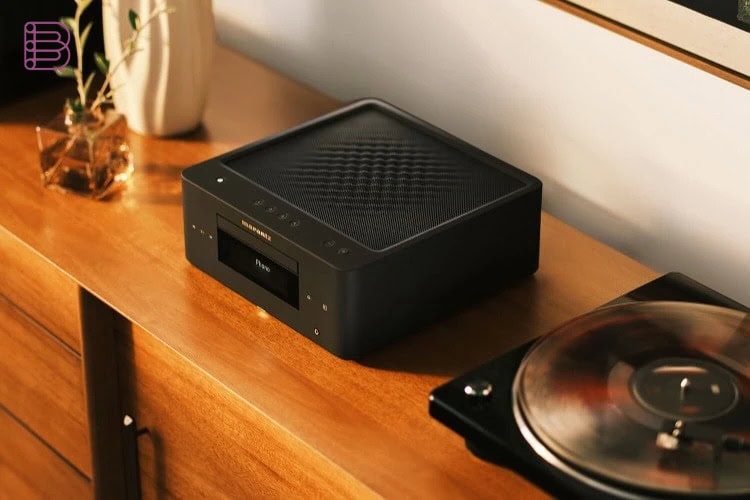 Marantz MCR 60n all-in-one hi-fi system on a wooden sideboard next to a turntable