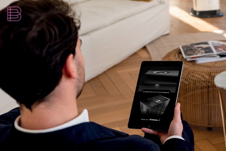 Naim CI-Uniti 102 controlled through the Focal and Naim app on a tablet