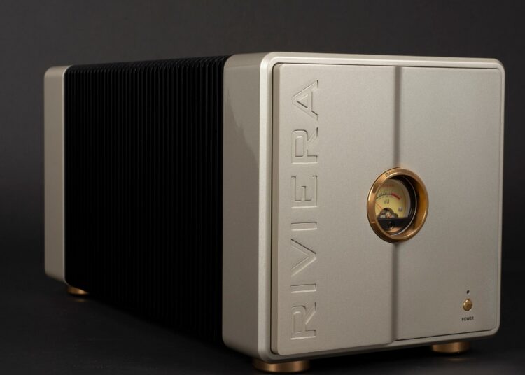 Riviera AFM100SE gold-finish monophonic power amplifier, angled studio shot