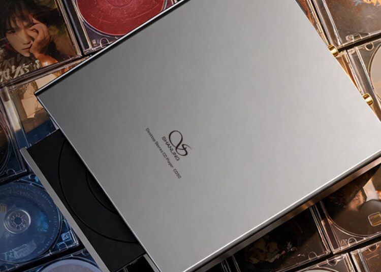 Shanling CD50 desktop CD player on a collection of CDs