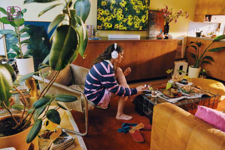 Sonos Beam Ultra soundbar under a TV in a colorful living room