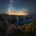 Sony SEL814G fisheye lens sample photo of a starlit sea cliff arch