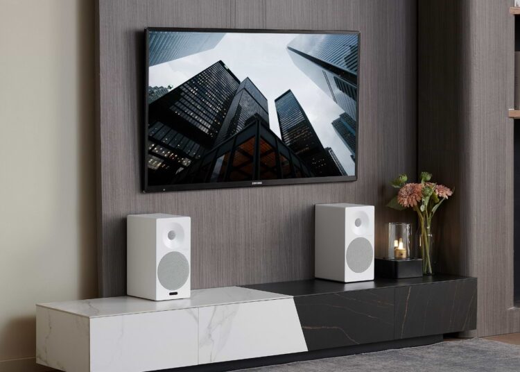 Tangent Spectrum II X5 Active BT speakers below a TV, connected via HDMI ARC in a living room