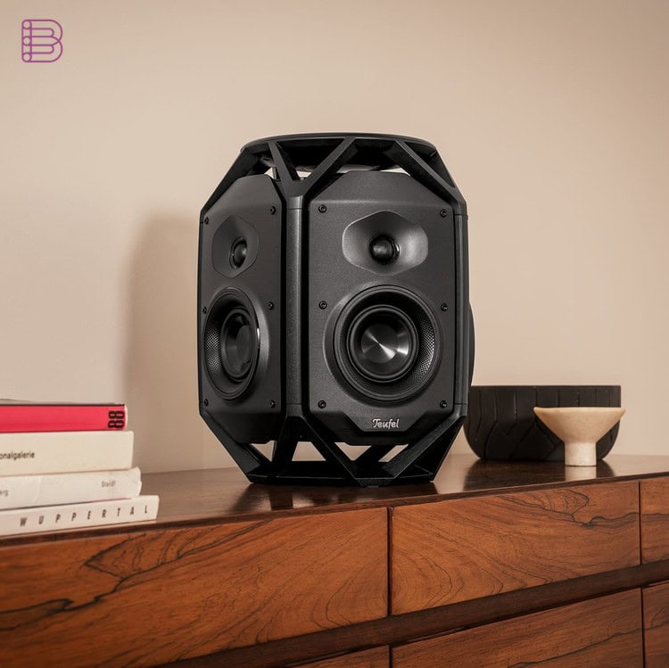 Teufel IKONIO wireless speaker on a wooden sideboard