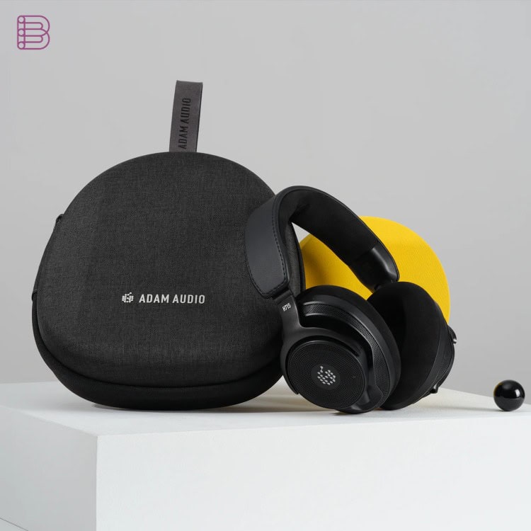ADAM Audio H715 Reference headphones next to the hardshell case