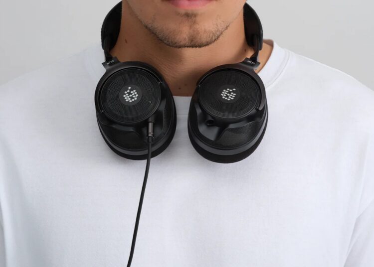 ADAM Audio H715 Reference open-back headphones worn around the neck