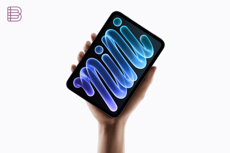 Apple iPad mini with 8.5-inch OLED display held in one hand