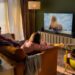 Apple TV 4K streaming a nature documentary in a cozy living room