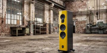 AudioSolutions Overture G4 floorstanding loudspeaker in an industrial loft setting