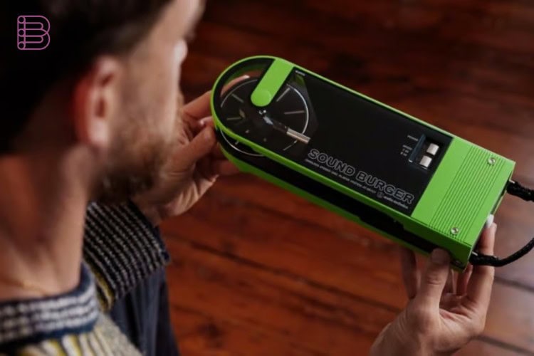 Audio-Technica Sound Burger AT-SB727 in green, held in hand