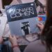 Visitor browsing vinyl records at the Audio Video Show record fair