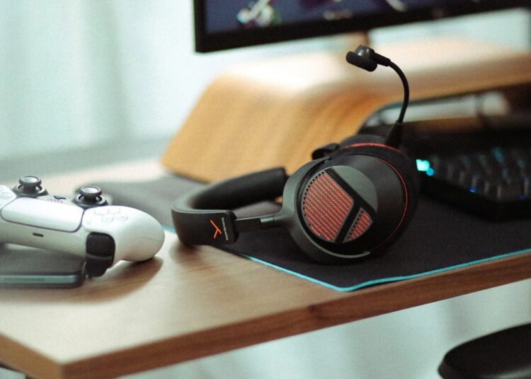 beyerdynamic MMX 130 wireless gaming headset on a gaming desk