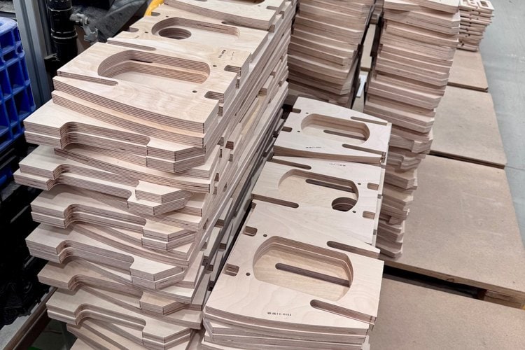 Stacks of precision-cut birch plywood braces