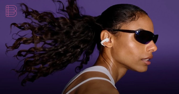 Bose open earbuds worn during a workout, representing the Bose product portfolio