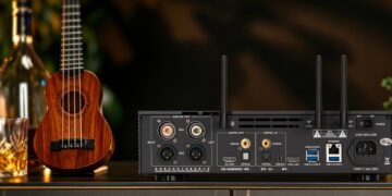 Cayin ID6 desktop streamer DAC and headphone amplifier in a lounge setting