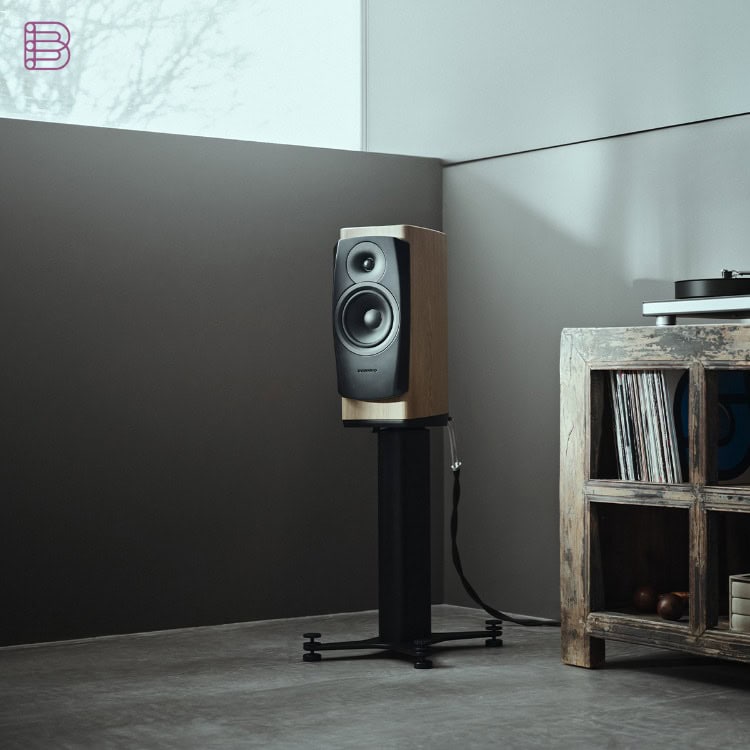 Dynaudio Confidence 20i bookshelf speaker on a shelving unit