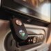 iFi UP Travel Max Bluetooth transceiver plugged into an airplane seat screen