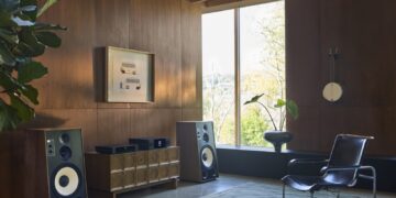 Pair of JBL L150 Classic loudspeakers in a wood-panelled listening room