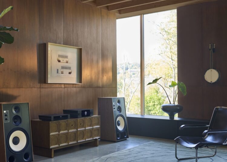 Pair of JBL L150 Classic loudspeakers in a wood-panelled listening room