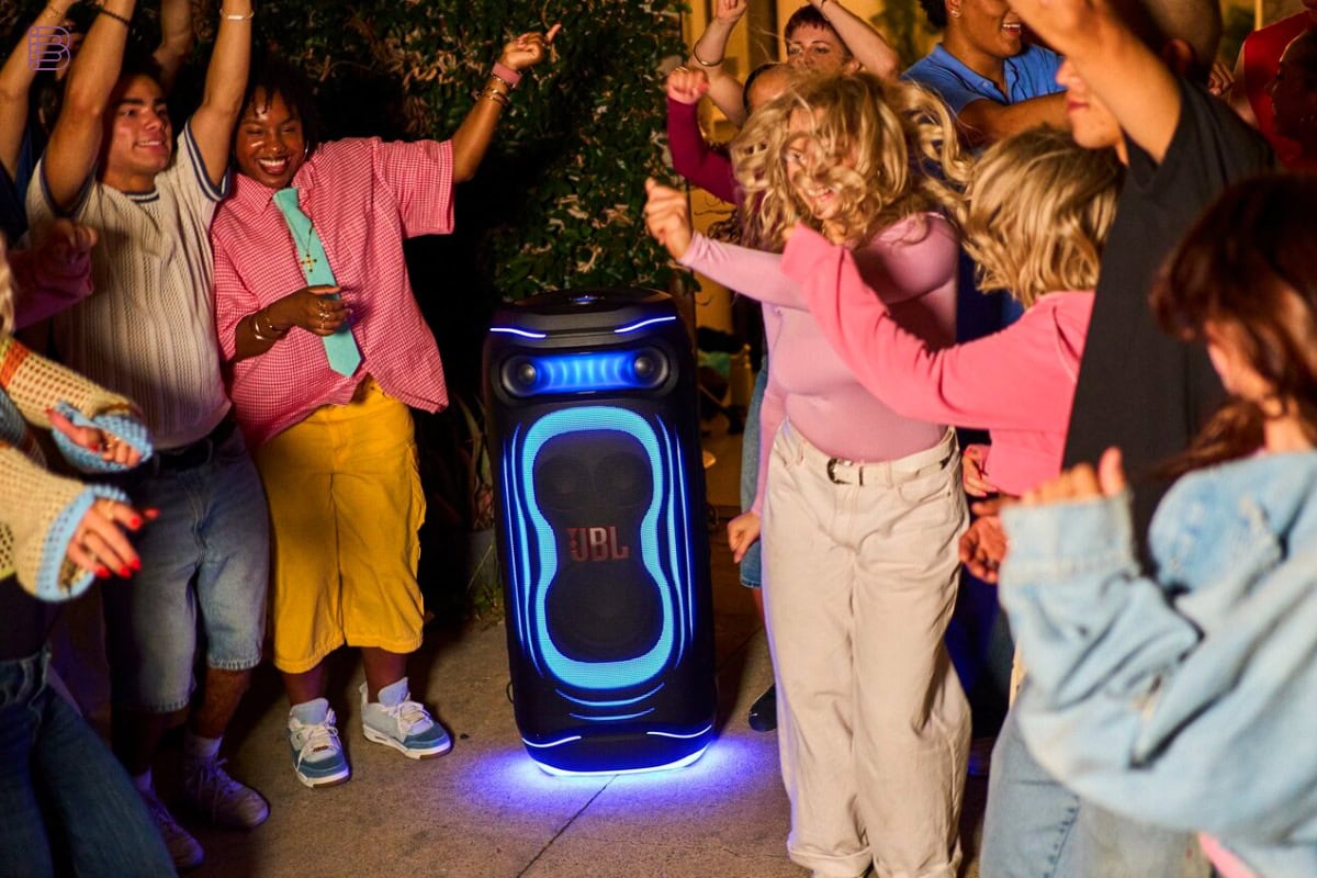 JBL PartyBox Ultimate 2 in use at an outdoor party with lightshow
