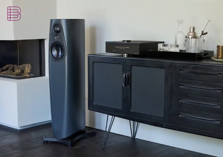 Linn 343 loudspeaker in the Triton finish beside a sideboard