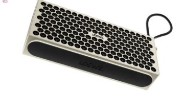 Loewe Neo portable Bluetooth speaker with aluminium grille and carry strap