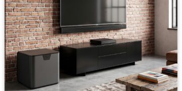 MartinLogan USR51 network AV receiver installed in a living room media console