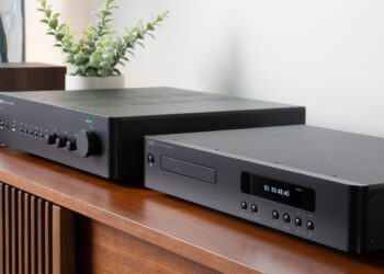 NAD C 359S integrated amplifier and C 569 CD player on a credenza